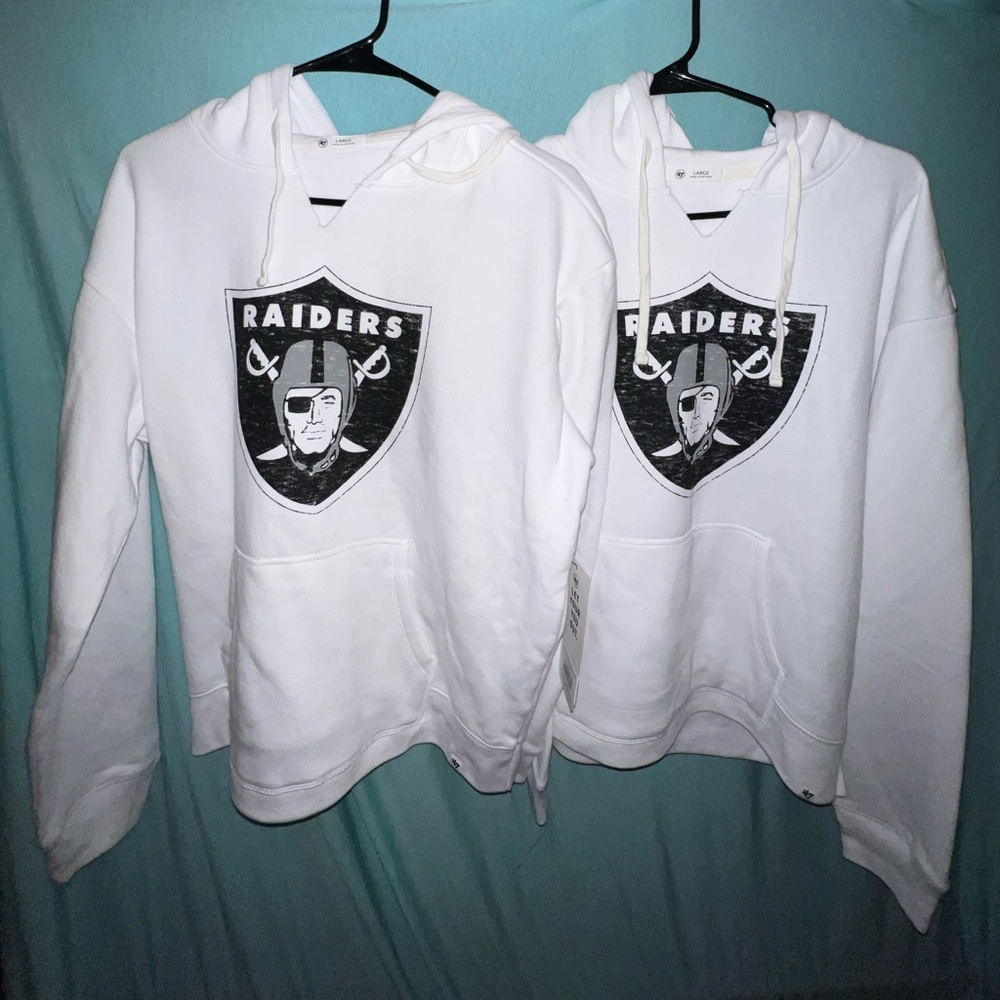 *TWO NFL RAIDERS WOMENS* 
White Hooded Zip-Up Sweater with Black Raiders Logo